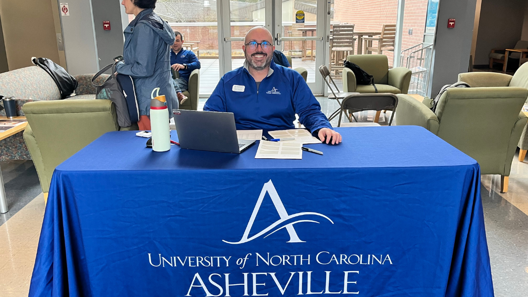 UNCA staff at table during 2024 FAFSA Day